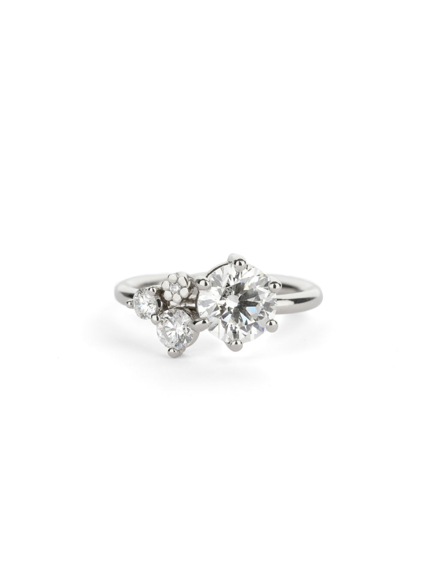 platinum and white diamond cluster engagement ring