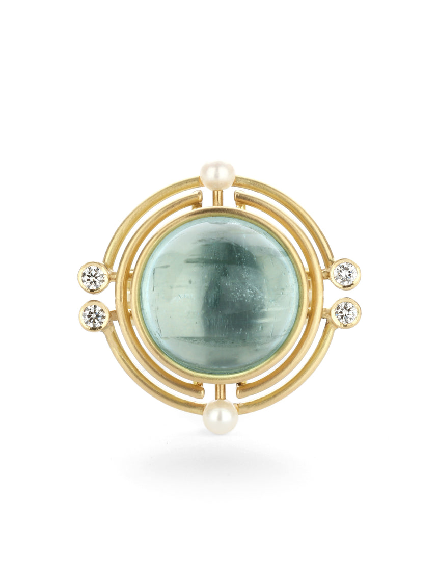 Aquamarine, pearl and diamond statement ring with concentric circular detail.