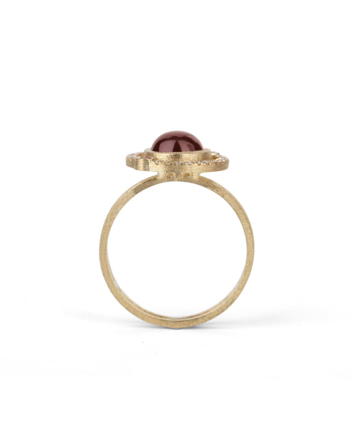 Geometric ring with red garnet and two orange sapphires and a diamond circular surround. 18ct yellow gold, textured finish. Side view.