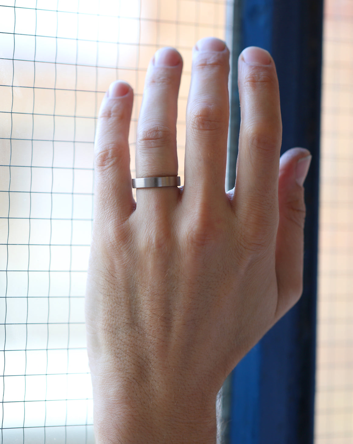 Flat wedding band. 18ct white gold, satin finish.