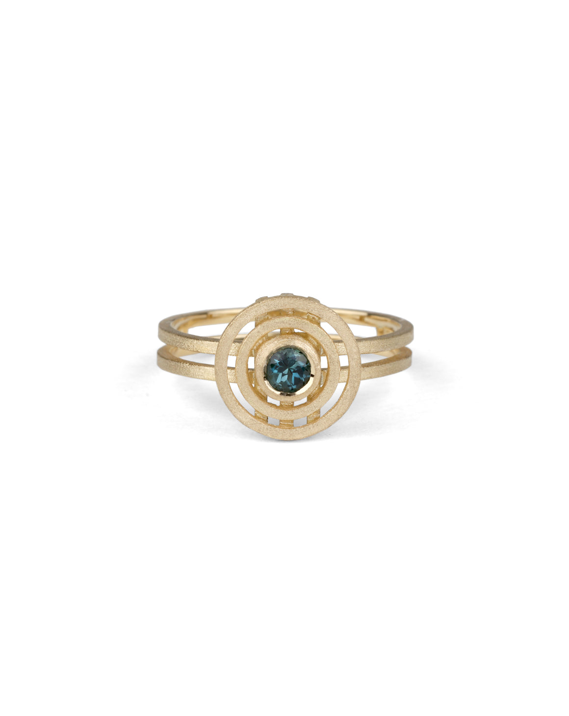 Geometric ring with concentric circles, central teal tourmaline. 18ct yellow gold, textured finish.