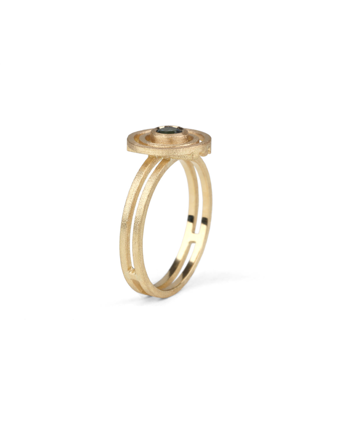 Geometric ring with concentric circles, central teal tourmaline. 18ct yellow gold, textured finish. Side view.