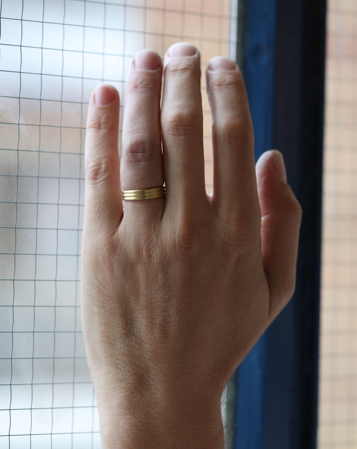 Three band wedding ring in 18ct yellow gold, satin finish.
