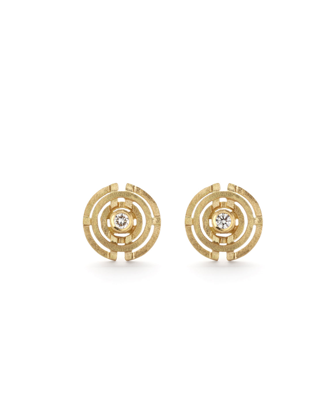 Geometric pendant with concentric circle detail, with central diamond. 18ct yellow gold, textured gold.