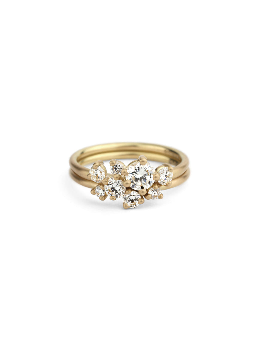 Diamond cluster nesting rings. 18ct yellow gold, satin finish.