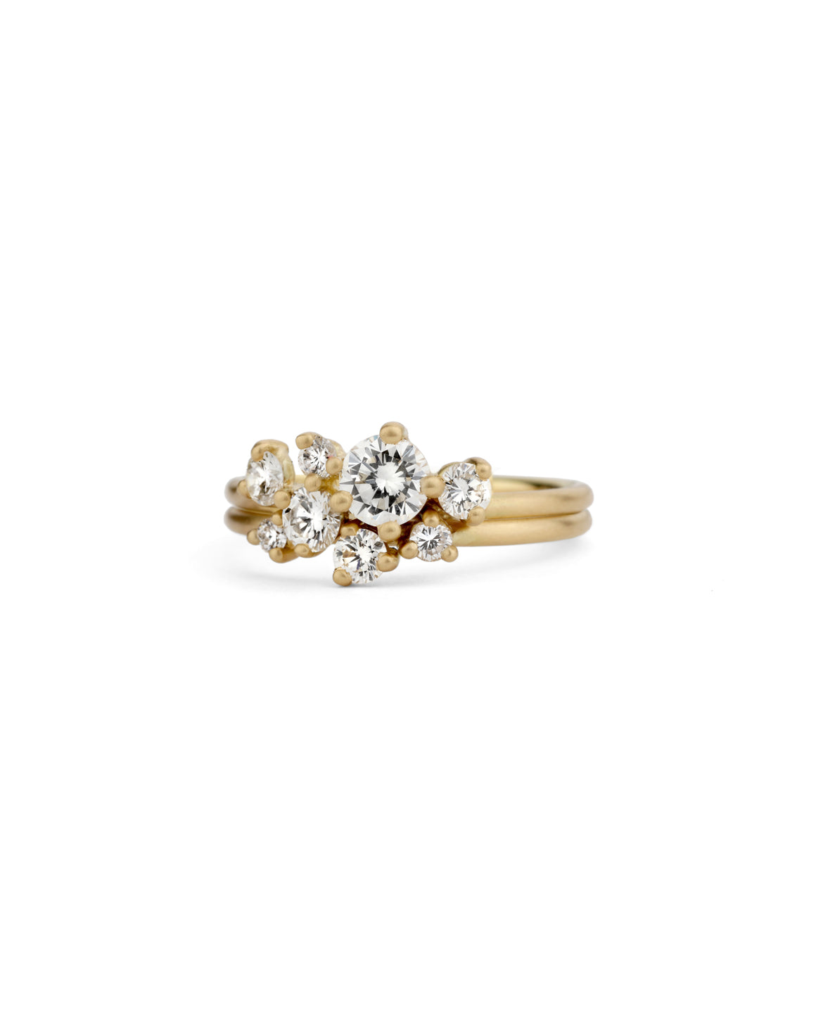 Diamond cluster nesting rings. 18ct yellow gold, satin finish.