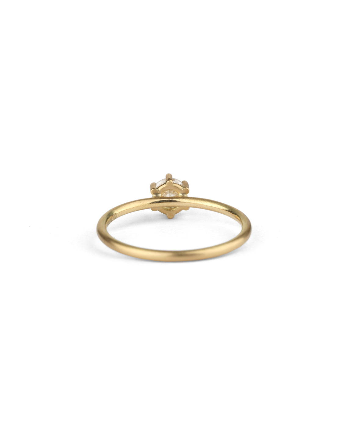 Solitaire ring with round white diamond, six claw setting. 18ct yellow gold, satin finish. Back view.