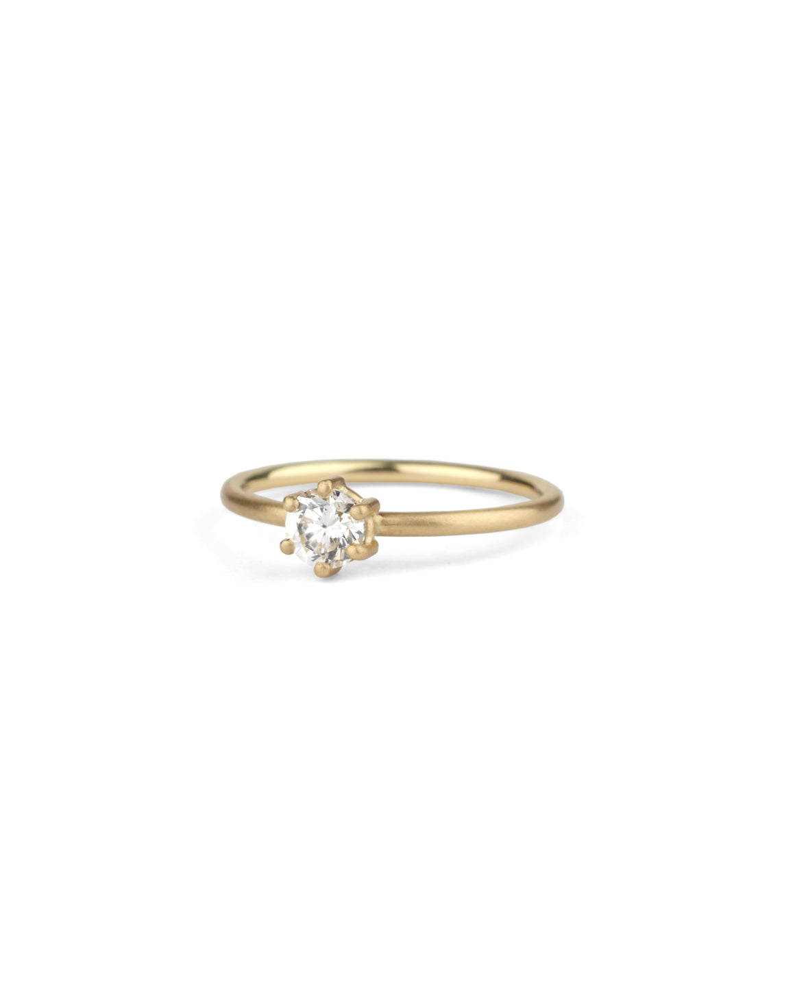 Solitaire ring with round white diamond, six claw setting. 18ct yellow gold, satin finish.