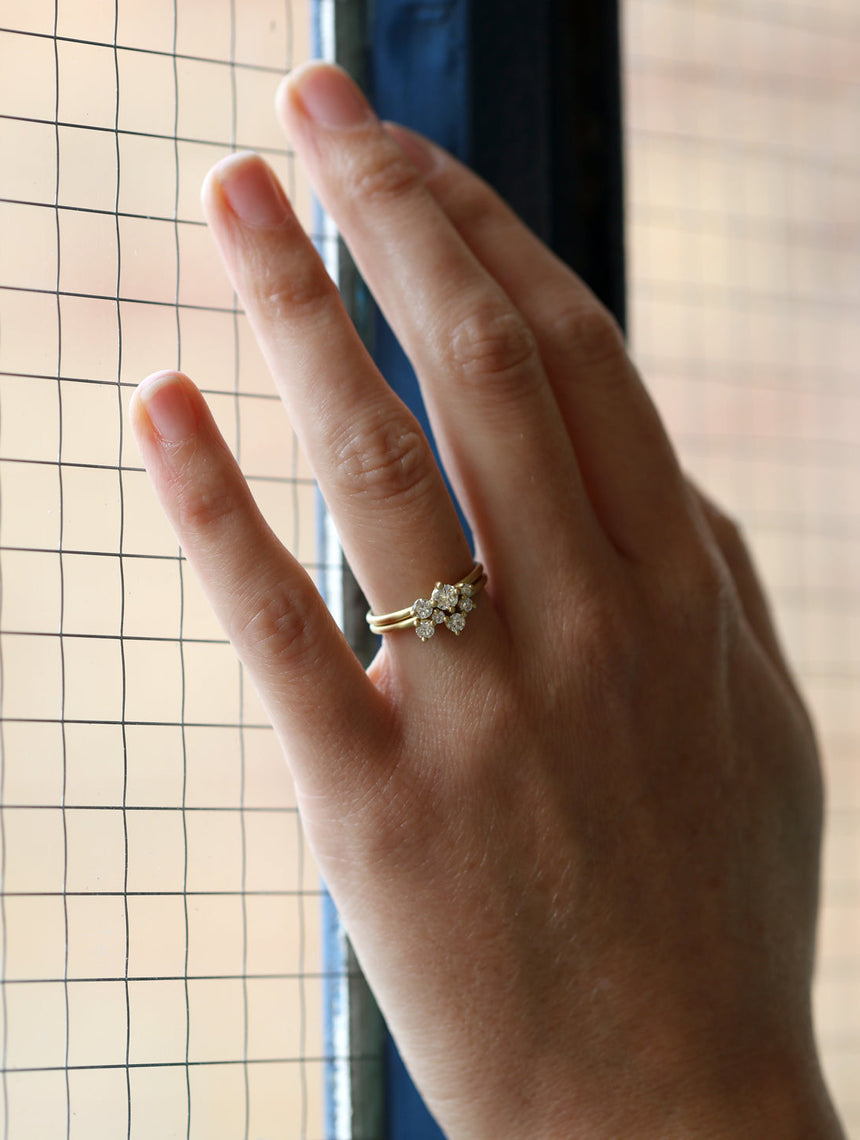 Cluster style fitted ring set, round white diamonds. 18ct yellow gold, satin finish. On hand.