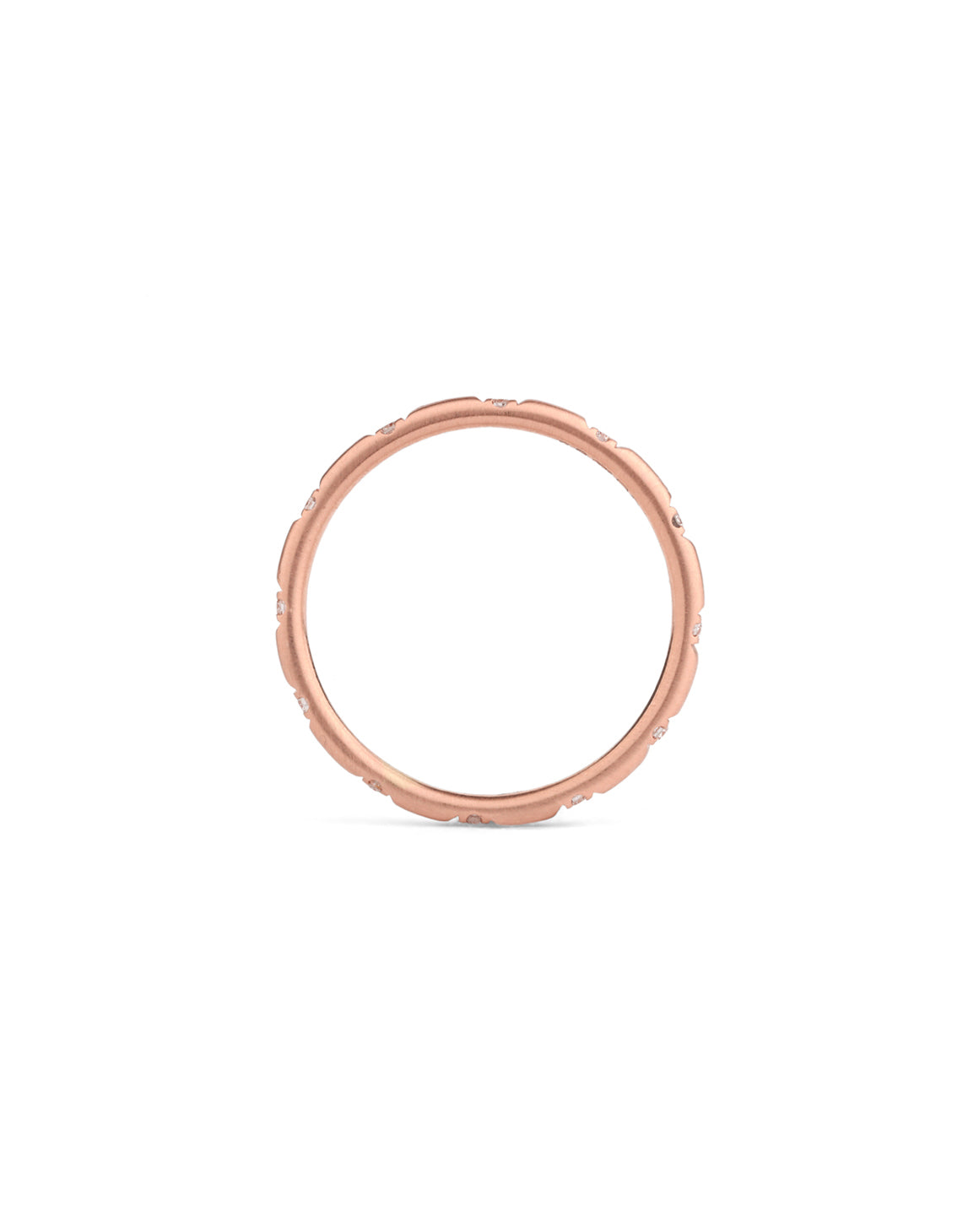 Rounded band set with tiny white diamonds. 18ct rose gold, satin finish. Side view.