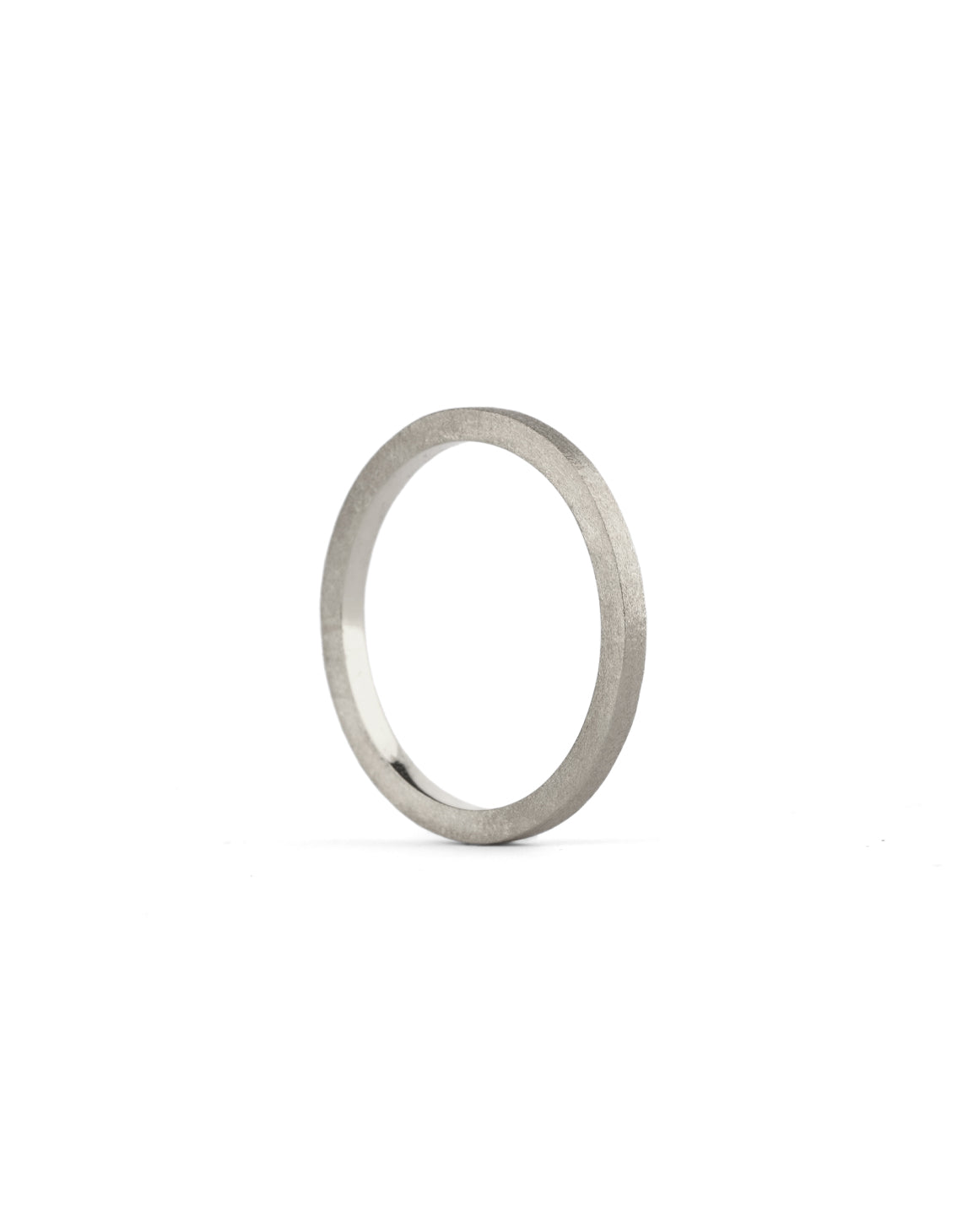 Flat wedding band. 18ct white gold, textured finish. Side view.