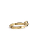 Solitaire ring with teal sapphire and double band. 18ct yellow gold, polished finish. Back view.