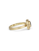 Blue green sapphire ring with a diamond halo, 18ct yellow gold textured finish. Side profile.