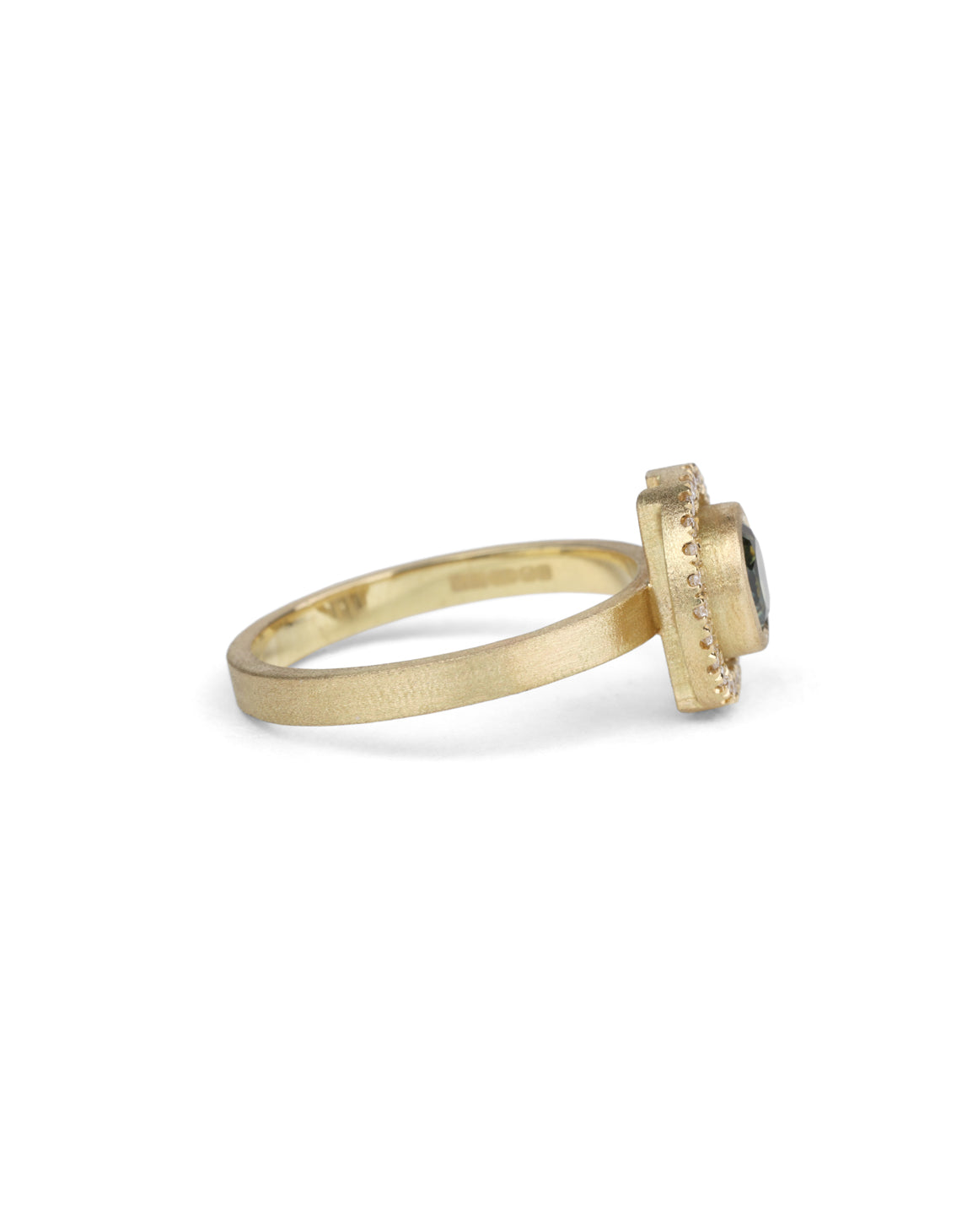 Blue green sapphire ring with a diamond halo, 18ct yellow gold textured finish. Side profile.