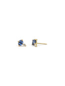 Stud earrings set with oval blue sapphires and white round diamonds. Simple claw setting 18ct yellow gold.