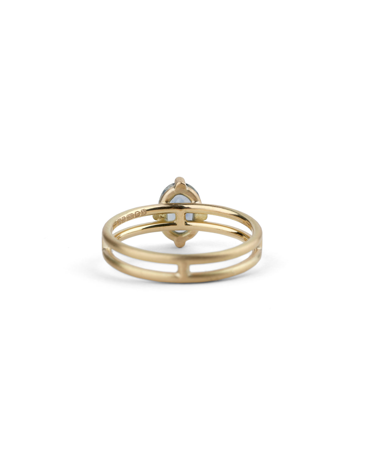 Steely blue oval sapphire ring. Four claw solitaire setting and double band, 18ct yellow gold satin finish, back view.