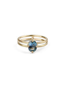 Steely blue oval sapphire ring. Four claw solitaire setting and double band, 18ct yellow gold satin finish, front view.