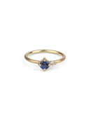 Round vivid blue sapphire ring with a round white diamond. 18ct yellow gold, satin finish.