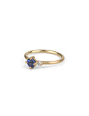 Round vivid blue sapphire ring with a round white diamond. 18ct yellow gold, satin finish.