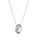 Circular Aquamarine and 18ct white gold necklace, side profile.
