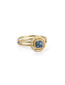 Octagon blue sapphire ring with surround detail and double band. 18ct yellow gold with satin finish.