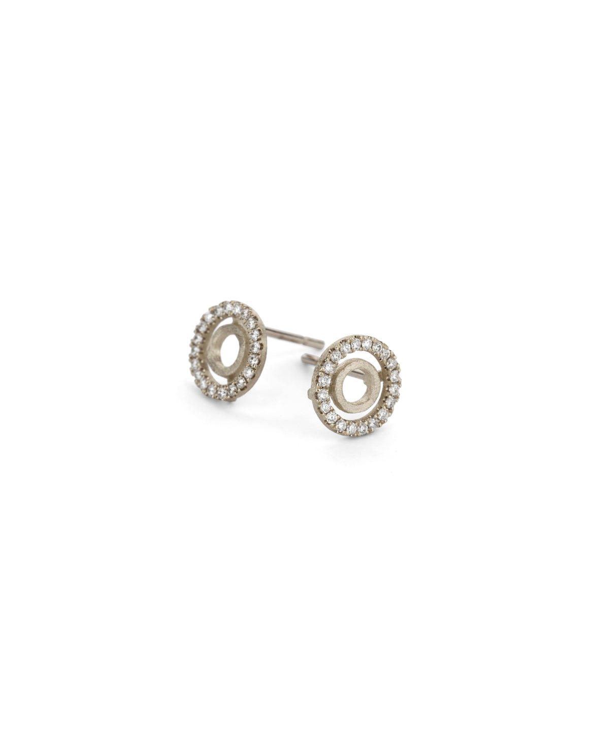 Circular stud earring with tiny diamond detail. 18ct white gold, textured finish.