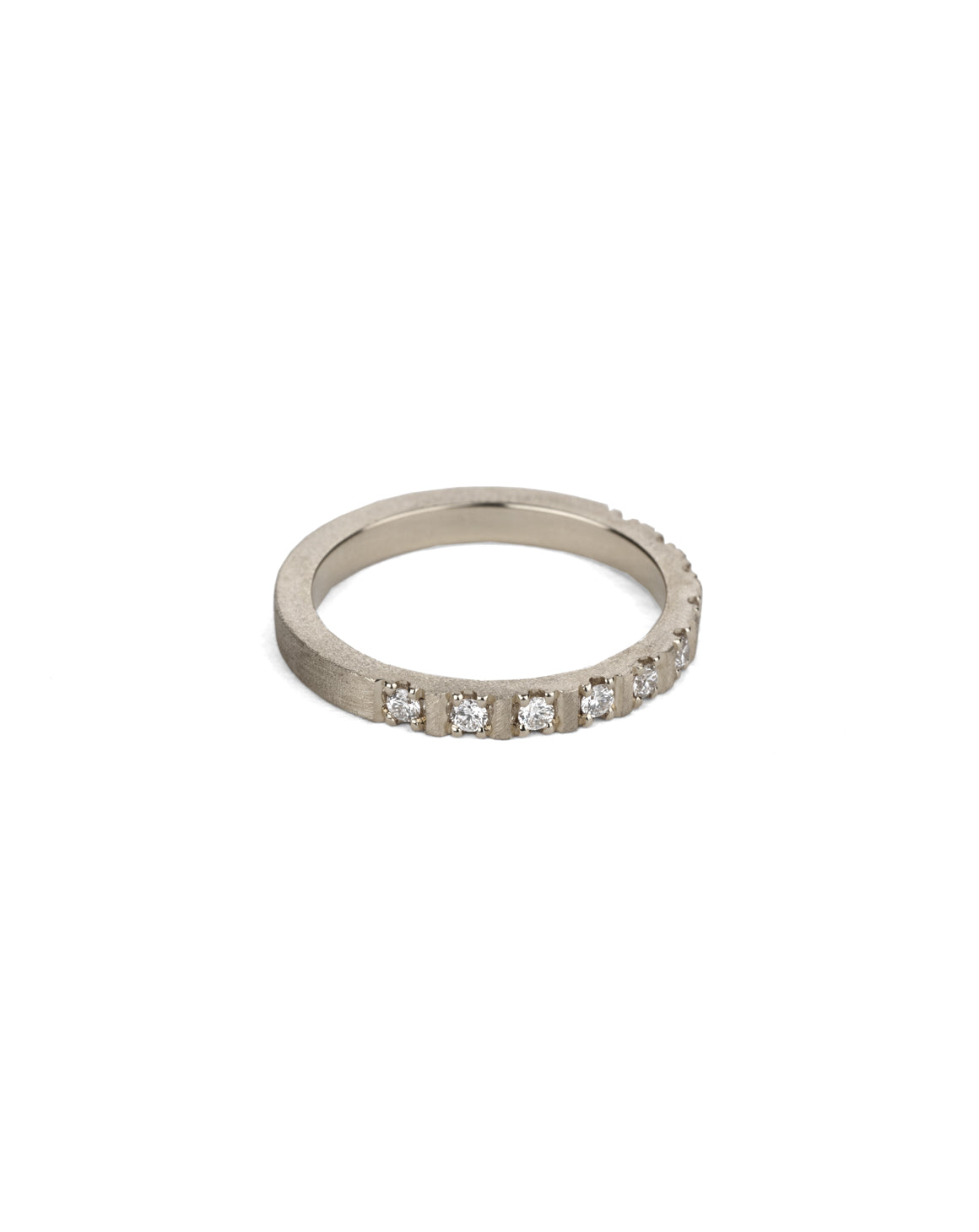 Band set with ten white diamonds. 18ct white gold with a textured finish.