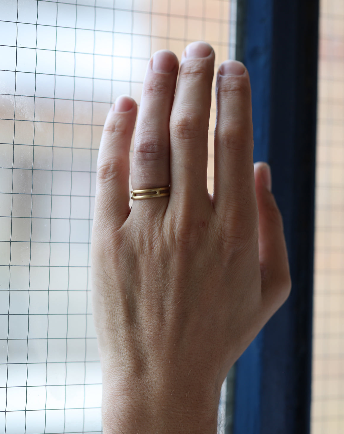 18ct yellow gold double band ring, satin finish. On hand.