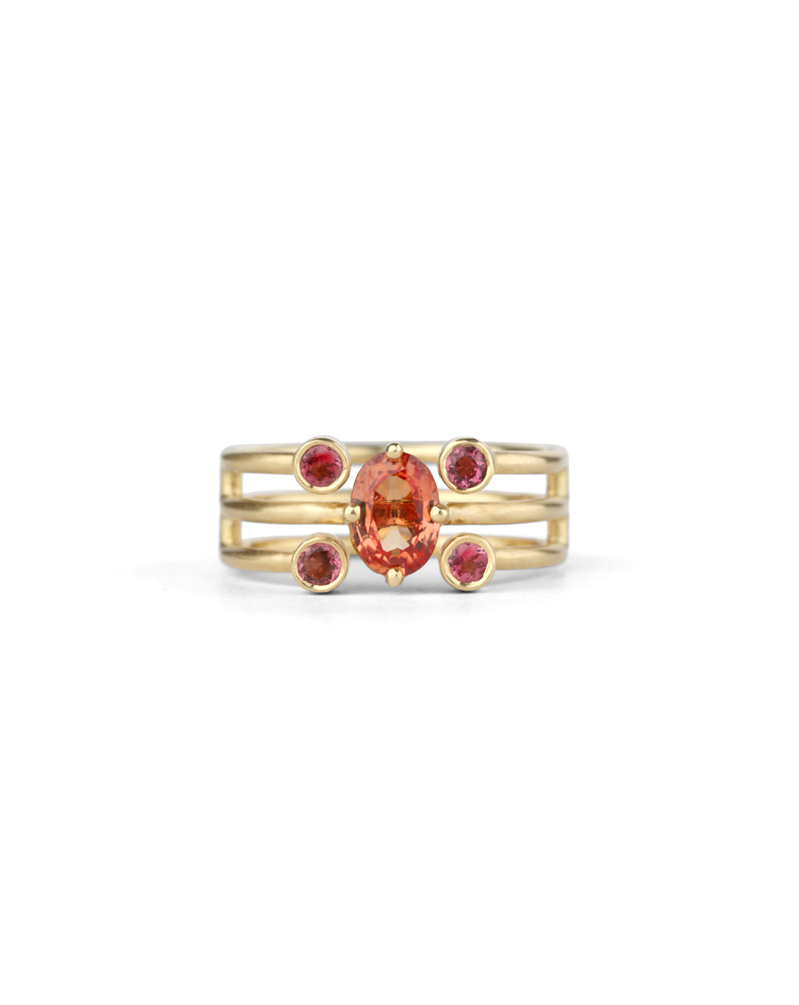 Statement three band ring with oval orange sapphire and four pink tourmalines. 18ct yellow gold, satin finish.