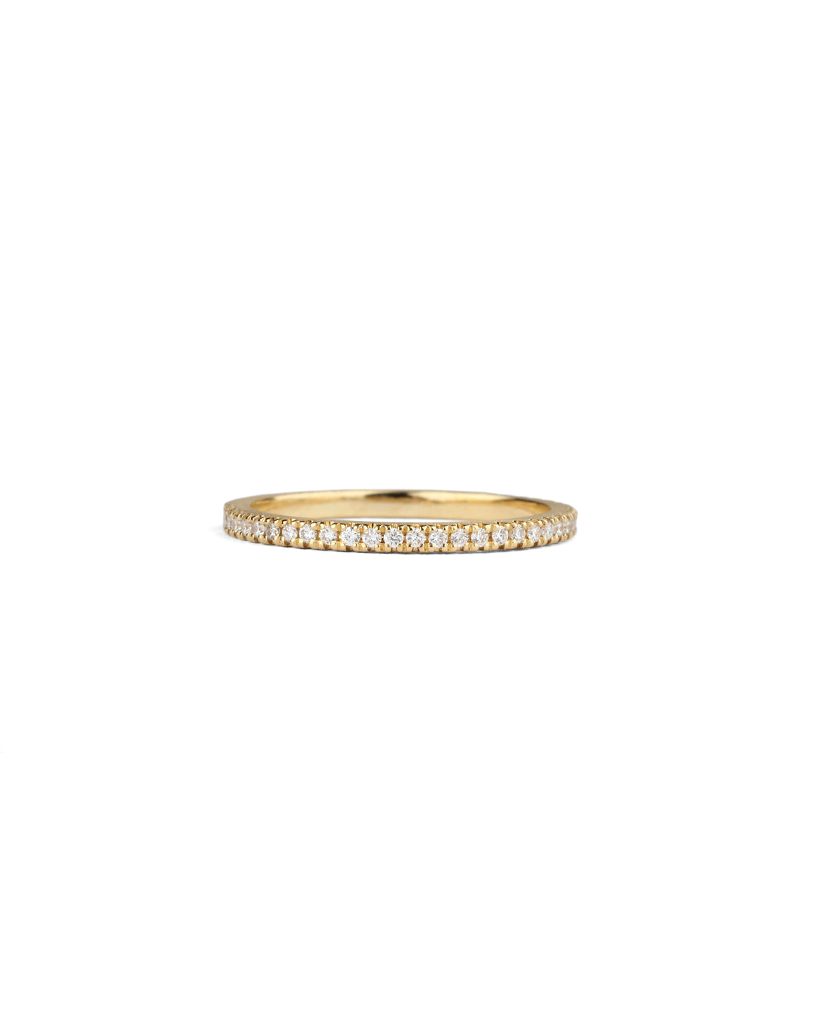 Slim diamond set band in 18ct yellow gold.