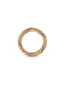 Rope style band ring with five different colour gold alloys twisted together. Side view.