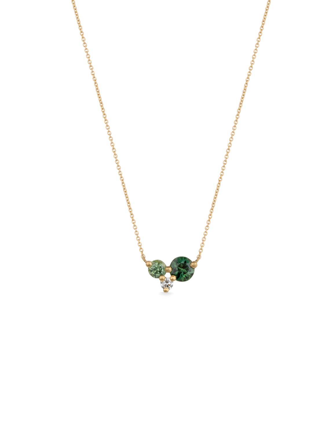 Delicate cluster pendant with two sapphires and white diamond. 