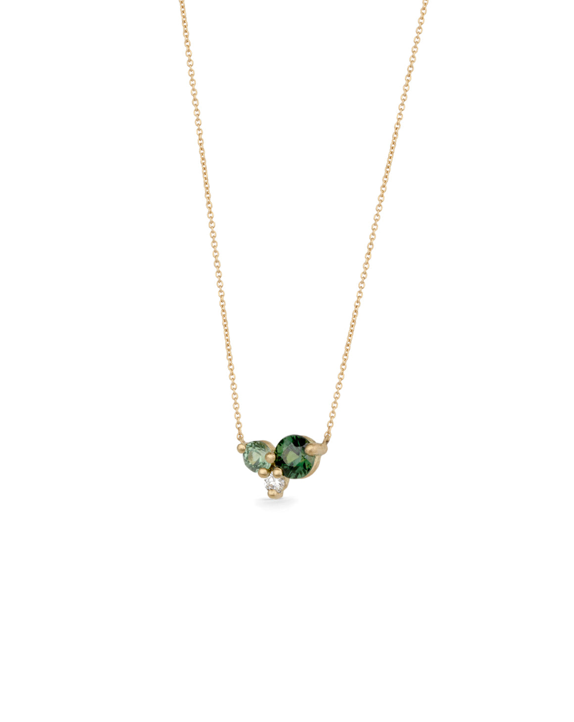 Delicate cluster pendant with two sapphires and white diamond. 