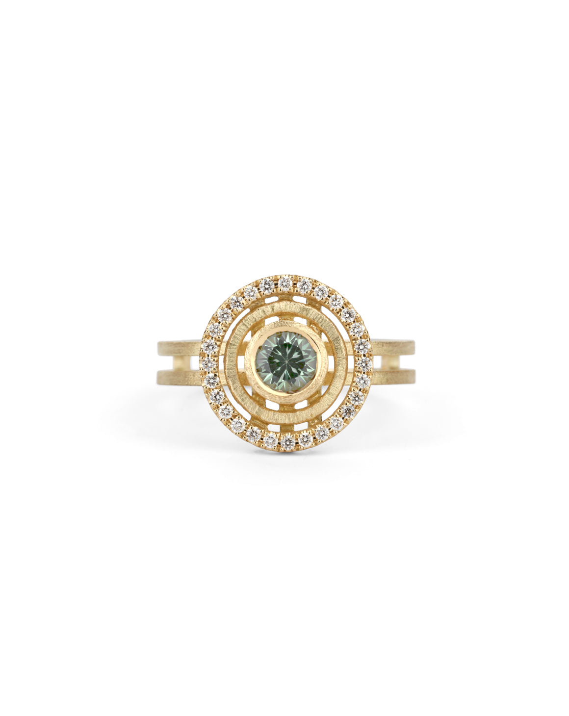Green sapphire ring with circular detail and white diamond outer halo.  18ct yellow gold, textured finish.