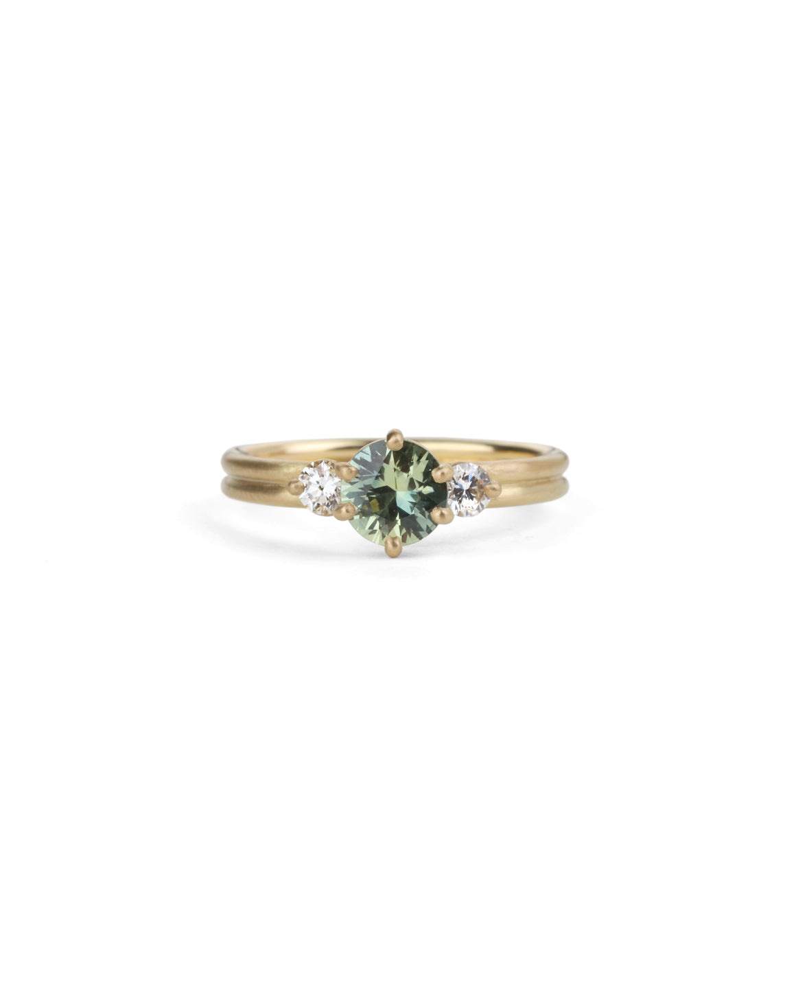 Three stone ring with green sapphire and white diamonds. Joined double band, 18ct yellow gold satin finish. 