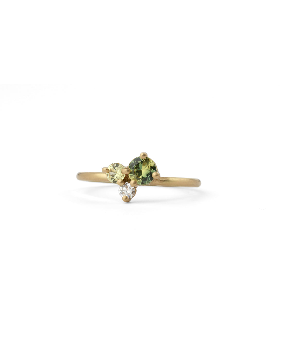 Cluster ring with green and yellow sapphire and a white diamond. 18ct yellow gold, satin finish.
