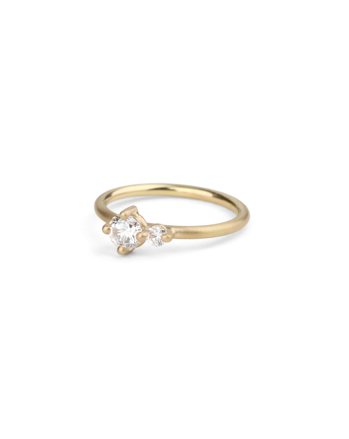 Two stone diamond ring. 18ct yellow gold, satin finish. Side view.