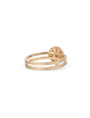 Solitaire ring with circular detail eith central diamond. 18ct rose gold, textured finish. Back view.