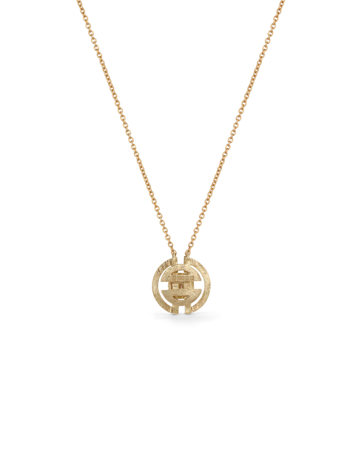 Geometric pendant with a round white diamond and semicircle detail. 18ct yellow gold, textured finish. Back detail.