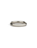 Curved ring band. 18ct white gold, polished finish.