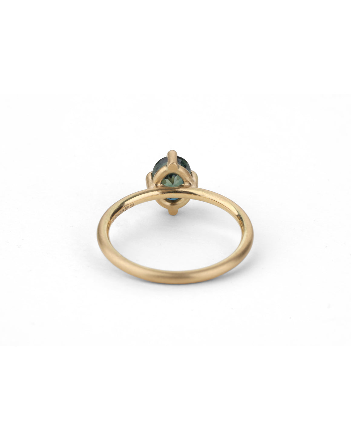 Solitaire ring with oval teal sapphire. 18ct yellow gold, satin finish. Back view.