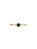 Solitaire ring with round teal sapphire. 18ct yellow gold, satin finish.