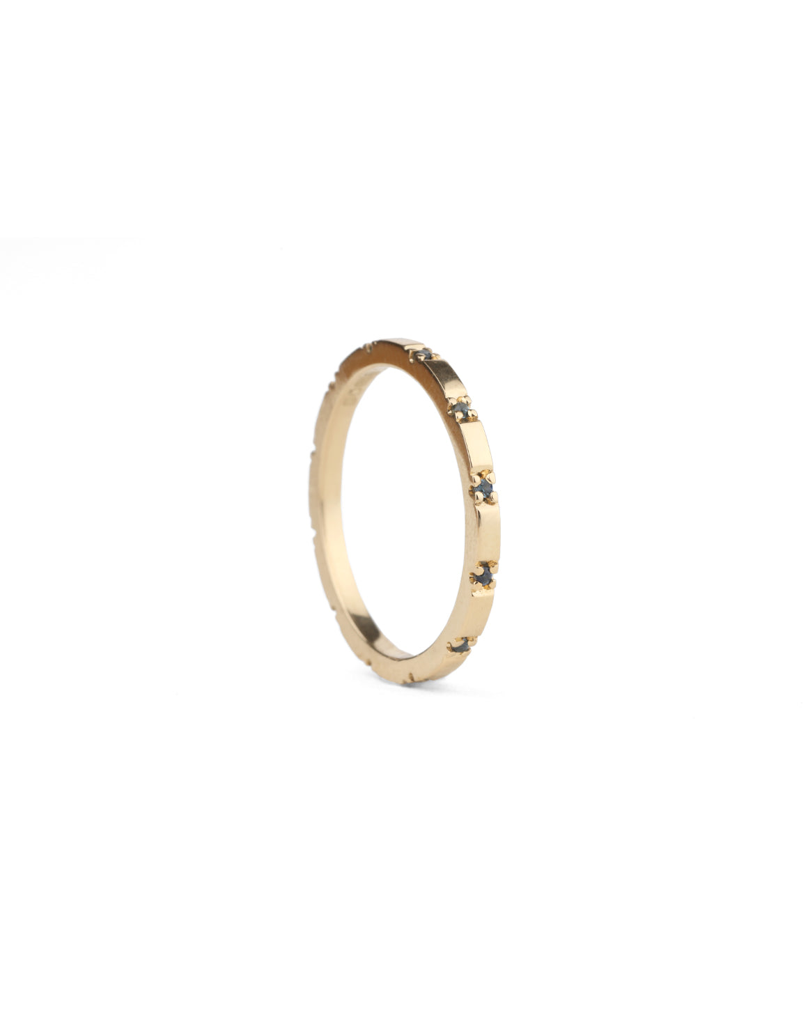 Fine band with tiny teal sapphires. 18ct yellow gold, polished finish.