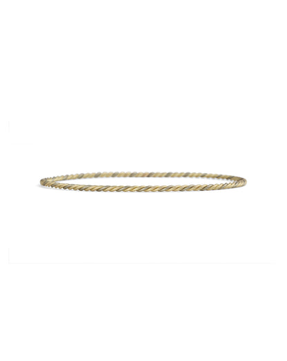 Rope style bangle with a mix of 18ct yellow and white gold. 