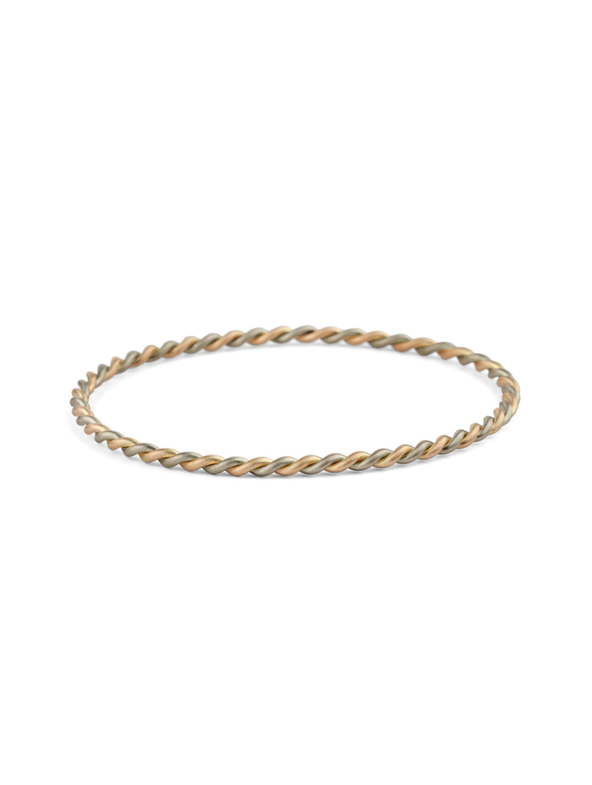 Rope style bangle bracelet.  18ct white and rose gold, satin finish.