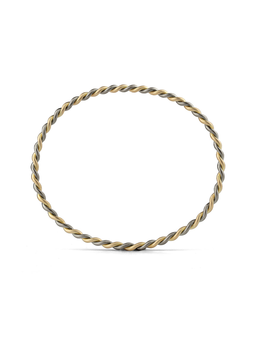 Rope style bangle bracelet.  18ct yellow and white gold, satin finish.