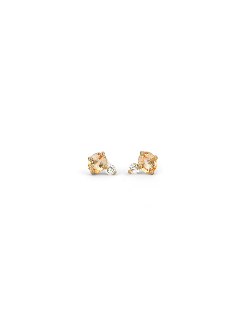 Stud earrings with oval yellow sapphires and white diamonds. 18ct yellow gold, satin finish.