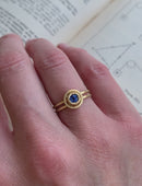 Marquise white diamond solitaire ring with double band. 18ct yellow gold, satin finish. On hand.