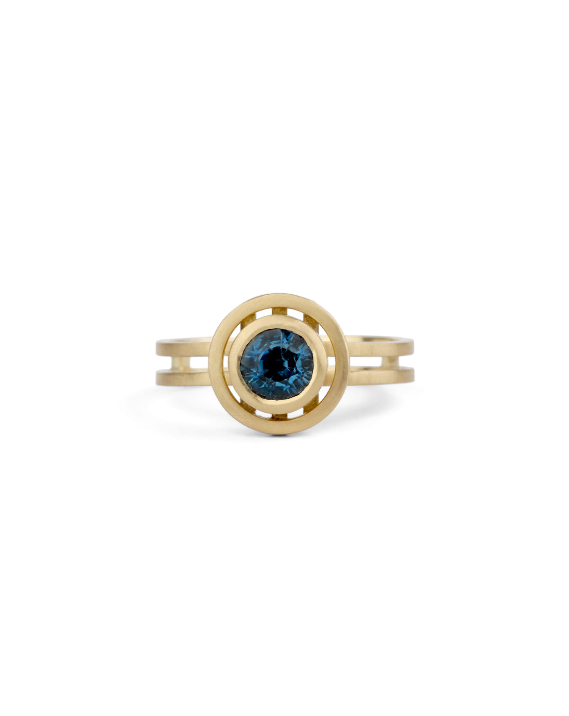 Deep round blue sapphire ring, gold circle detail around the sapphire, double band. 18ct yellow gold with satin finish.