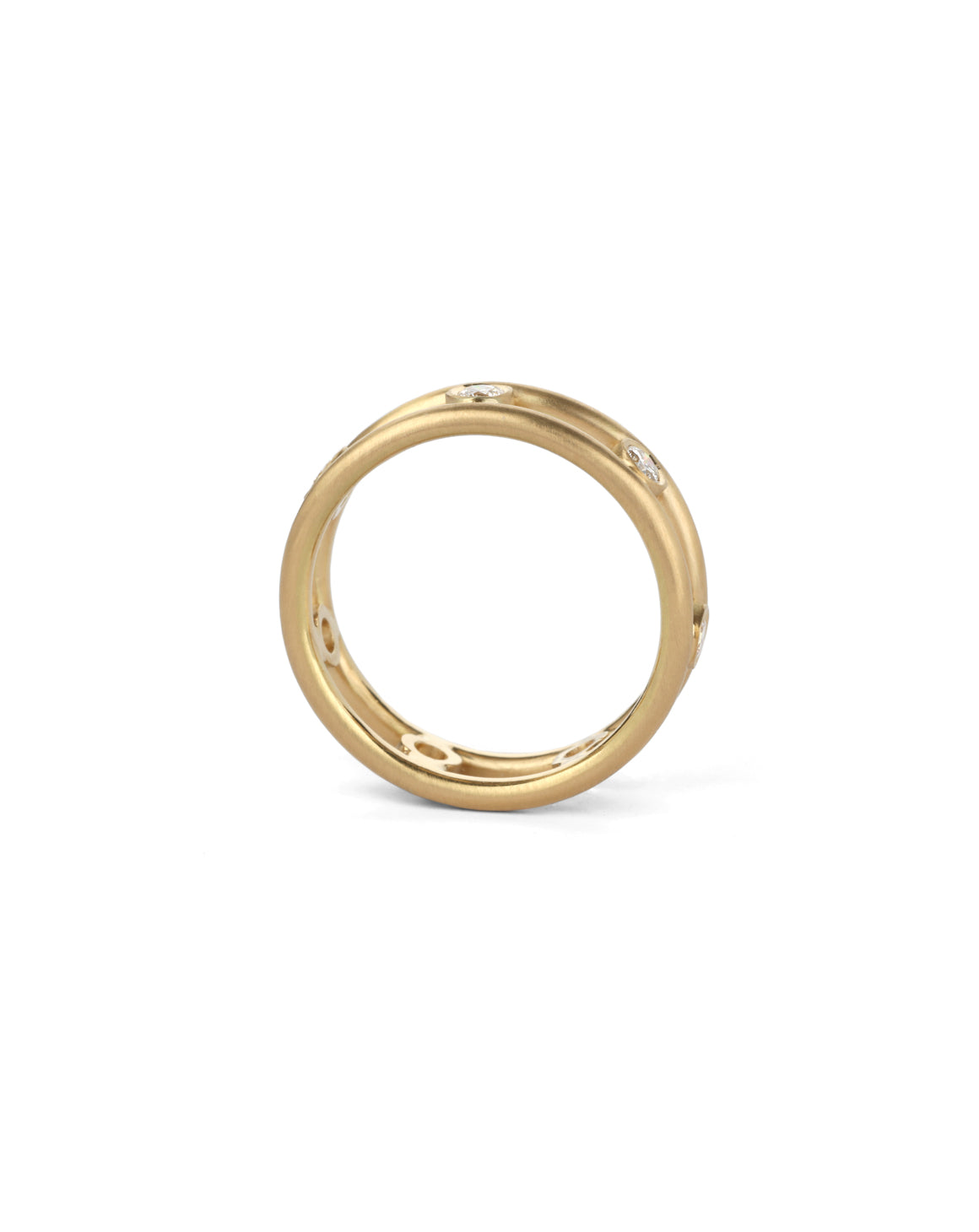 Ring with double band and seven white diamonds set in between. 18ct yellow gold, satin gold. Side view.
